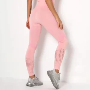 Licra deportiva rosa con malla en piernas. Legging deportivo cintura alta, pretina ancha, con delicada malla transparente en piernas.